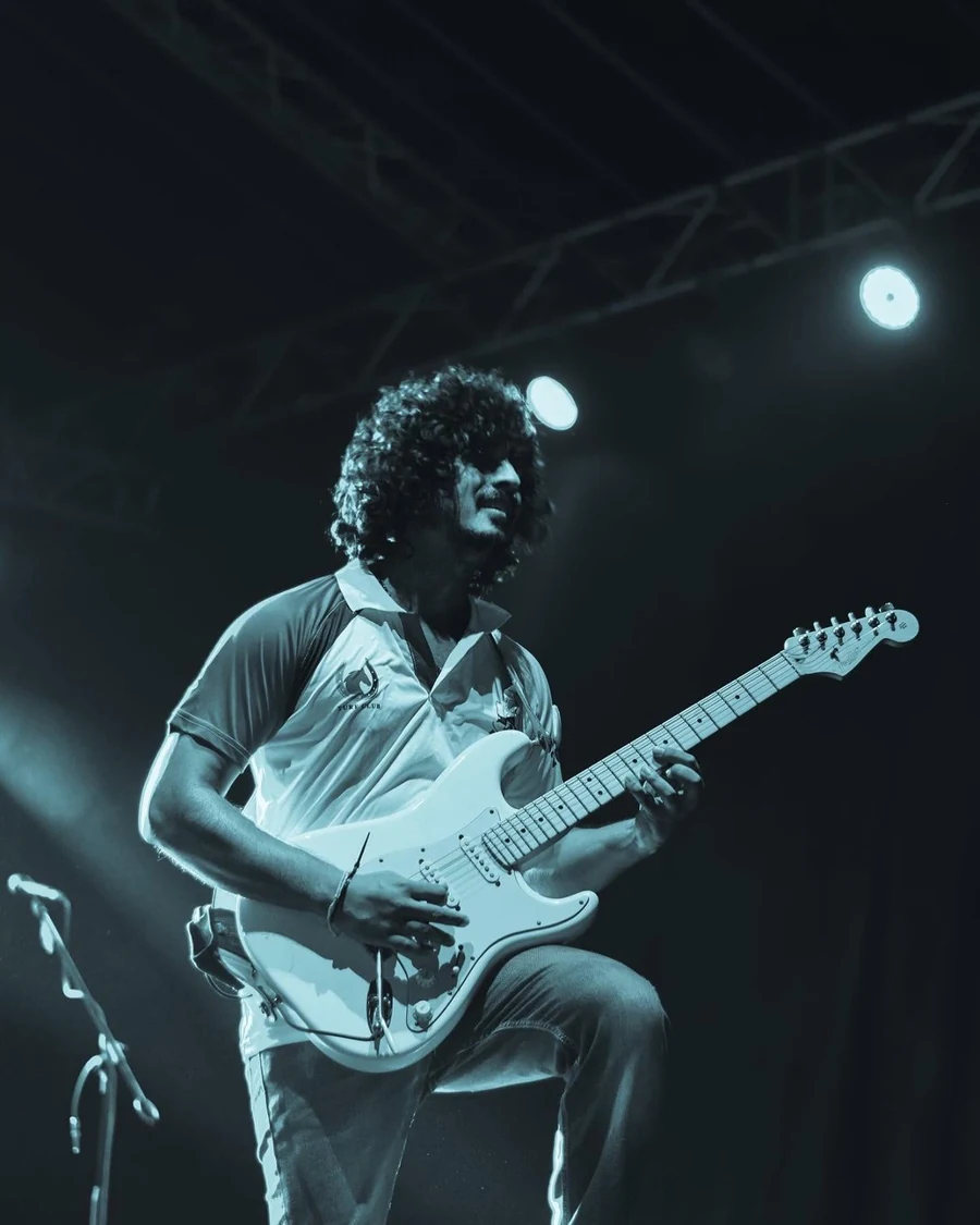 Milinda Batuvanthudave playing lead guitar